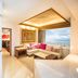 Grand Fiesta Americana Guadalajara Country Club suite with corner seating area and city view in Guadalajara