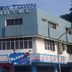 Hotel New Tauns Klang in Klang, blue corner hotel exterior with rooftop sign and Bubble Tea shop