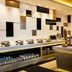 Oakwood Residence Kapil Hyderabad buffet station with chafing dishes and beverage dispensers in a modern dining area