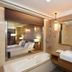 Fullon Hotel Hualien bathroom with soaking tub, dual sinks, and large mirror in Hualien City