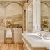 The Welcombe Hotel, Stratford-upon-Avon bathroom with mural, bathtub, double sink and cheetah décor