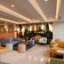 Hilton Garden Inn Mexico City Polanco lobby lounge with colorful seating and mural wall in Mexico City