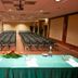 Mercure Reggio Emilia Centro Astoria meeting room with rows of chairs and presentation table in Reggio nell'Emilia