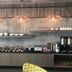 The Preston House and Hotel in Riverhead breakfast buffet with pastries, bowls, coffee dispensers and hanging lights