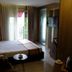 Royal Capital Thermal & Spa Hotel in Bursa guest room with balcony door, bed, TV and seating area