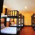 Twin Palms Hostel Phi Phi dorm room with black bunk beds in Ko Phi Phi