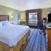 Hampton Inn Pittsburgh Area-Beaver Valley-Ctr Township room in Monaca with king bed, desk and window view