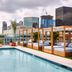 AC Hotels by Marriott San Diego Downtown Gaslamp Quarter rooftop pool with cabanas and skyline view