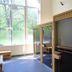 Bitter en Zoet in Veenhuizen sauna room with wooden cabins and large windows