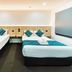 Country 2 Coast Motor Inn Coffs Harbour twin room with two single beds and teal bedding