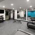 La Quinta Inn & Suites by Wyndham Atlanta Roswell gym with treadmills, weights and mirrored walls