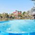 Amphawa Club Resort & Spa in Amphawa: infinity-style pool beside a river with waterside views