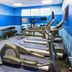 Four Points by Sheraton Raleigh Durham Airport fitness room in Morrisville with treadmills, bikes and weights