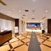 Chisun Hotel Koriyama lobby with check-in counter, seating area, and patterned floor in Kōriyama