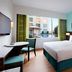 Fairfield by Marriott Bengaluru Outer Ring Road guest room with king bed and pool view in Bengaluru