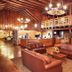 Cumberland Falls State Resort Park lobby in Corbin with leather seating, wood beams and staircase