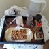 Il Riposo del Guerriero Guesthouse in Genoa breakfast tray with mugs, kettle, tea, jam, and pastries