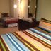 Mountain Harbor Resort and Spa in Mount Ida room with three beds and a floor lamp