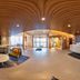 Fairfield by Marriott Inn & Suites Milwaukee Brookfield lobby with curved wood ceiling and front desk