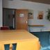 Meeting room at Gesundheitshotel Das Bad Peterstal in Bad Peterstal-Griesbach with tables, chairs and potted plants
