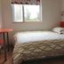 Pod Inn Shanghai Lujiazui guest room with bed and window in Shanghai