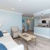 Crane's Beach House Boutique Hotel & Luxury Villas in Delray Beach, open-plan villa with kitchen and seating