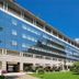 Golden Tulip Aix Les Bains in Aix-les-Bains, modern hotel exterior with terrace and landscaped grounds