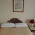 Green Acre Motel in Bridgend guest room with double bed and matching bedside lamps