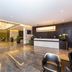 Flora Park Deluxe Hotel Apartments Dubai lobby with marble floors and reception desk