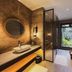 Maradiva Villas Resort & Spa in Flic en Flac, spa-style bathroom with walk-in shower and garden view