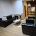 Rina Vista lobby lounge in Braşov with black leather seating, small tables, and potted plant