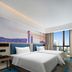 Hampton By Hilton Beijing Wangjing guest room with twin beds and city view in Beijing