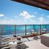 Dreams Natura Resort & Spa in Puerto Morelos: ocean-view rooftop terrace with hot tub and loungers