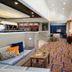 Courtyard by Marriott Kansas City Overland Park/Metcalf lobby lounge with seating and bright windows