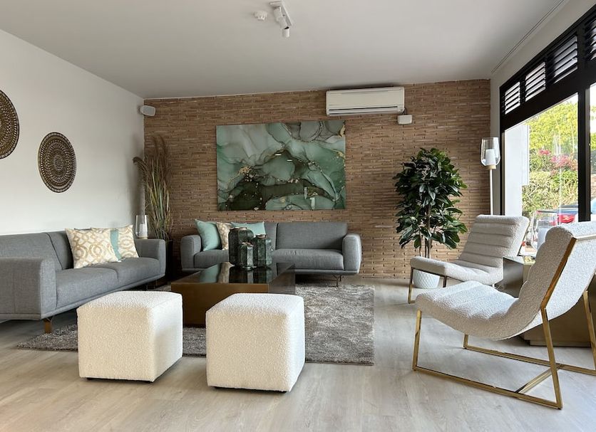 Select Sunningdale in San Miguel De Abona lounge with sofas, armchairs, wall art and large windows