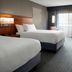 Courtyard by Marriott Los Angeles Torrance/Palos Verdes guest room with two beds and desk