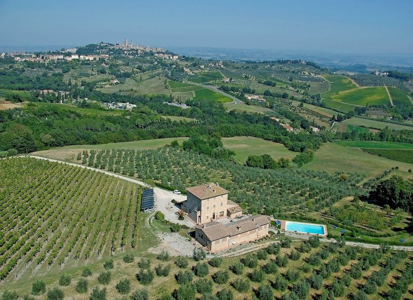 Agriturismo Il Casolare Di Bucciano in San Gimignano with hillside vineyards and outdoor pool