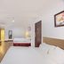 A25 Hotel - 14 Pho Duc Chinh guest room in Ho Chi Minh City with two beds and wood flooring