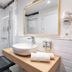B&b Hotel Apartamentos Madrid Centro Fuencarral 46 bathroom with walk-in shower, vessel sink and mirror