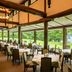 Towada Prince Hotel in Kosaka dining room with large windows overlooking a lake and green lawn