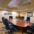 Holiday Inn Express & Suites Waterford By IHG boardroom with conference table and office chairs