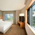Four Points by Sheraton Seoul Guro guest room with king bed, city-view window, and work desk in Seoul