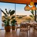 Herdade da Malhadinha Nova - Relais & Châteaux dining room with safari-style field views in Beja
