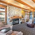Worldmark Deer Harbor lobby with stone fireplace, seating area and front desk in Deer Harbor