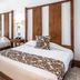 Be Live Experience Hamaca Suites, Boca Chica guest room with two beds, large window, and tile floor
