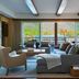Residences at The Little Nell Aspen living room with mountain views and fireplace