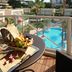 Balcony table with breakfast overlooks pool at AC Hotels by Marriott Ambassadeur Antibes- Juan les Pins, Antibes