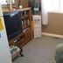 The Grateful Bed B'n'B in Prince George: cozy guest room with loveseat, TV, and water cooler