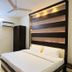 Ritumbhara Resorts Alwar guest room with double bed, ceiling fan and wardrobe