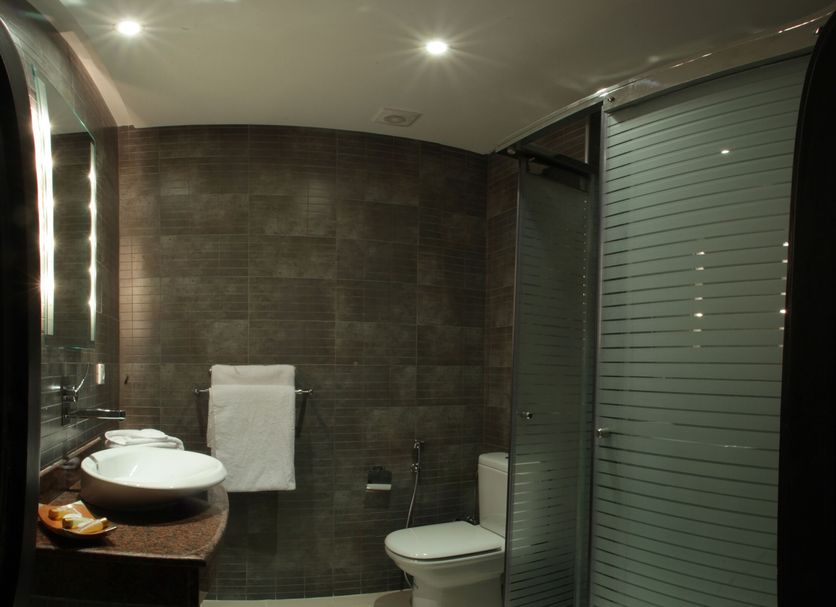 Tempoo Hotel Marrakech City Centre Adults Only bathroom with sink, toilet and glass shower enclosure